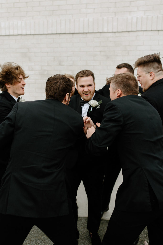 Groom and groomsman portraits in Carmel, Indiana