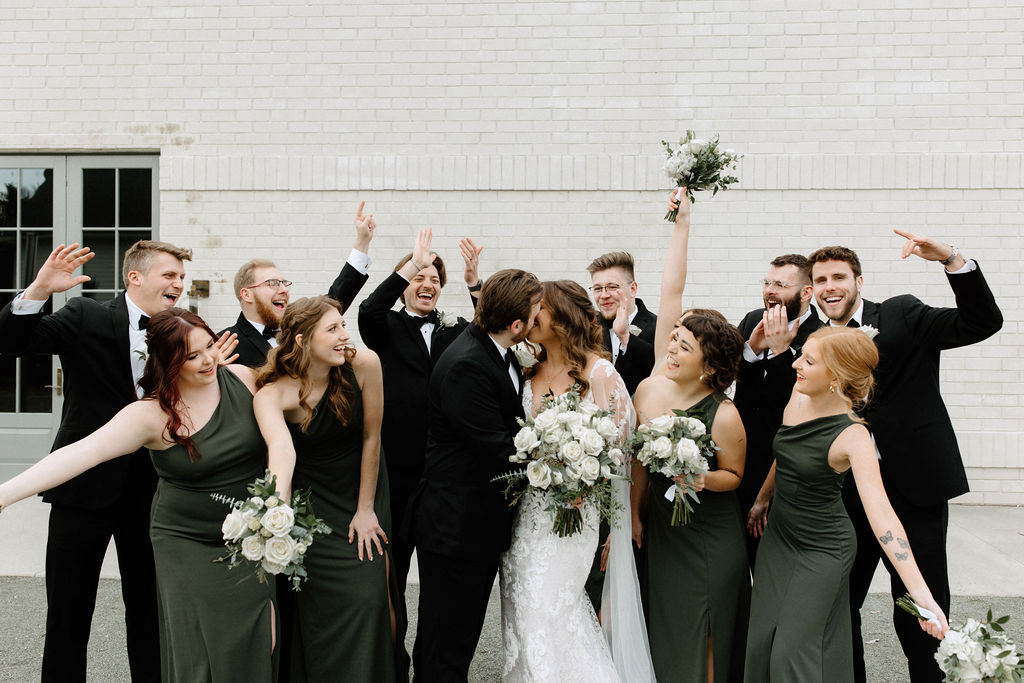 Bridal party posing for photos at The Ritz Charles in Carmel, Indiana