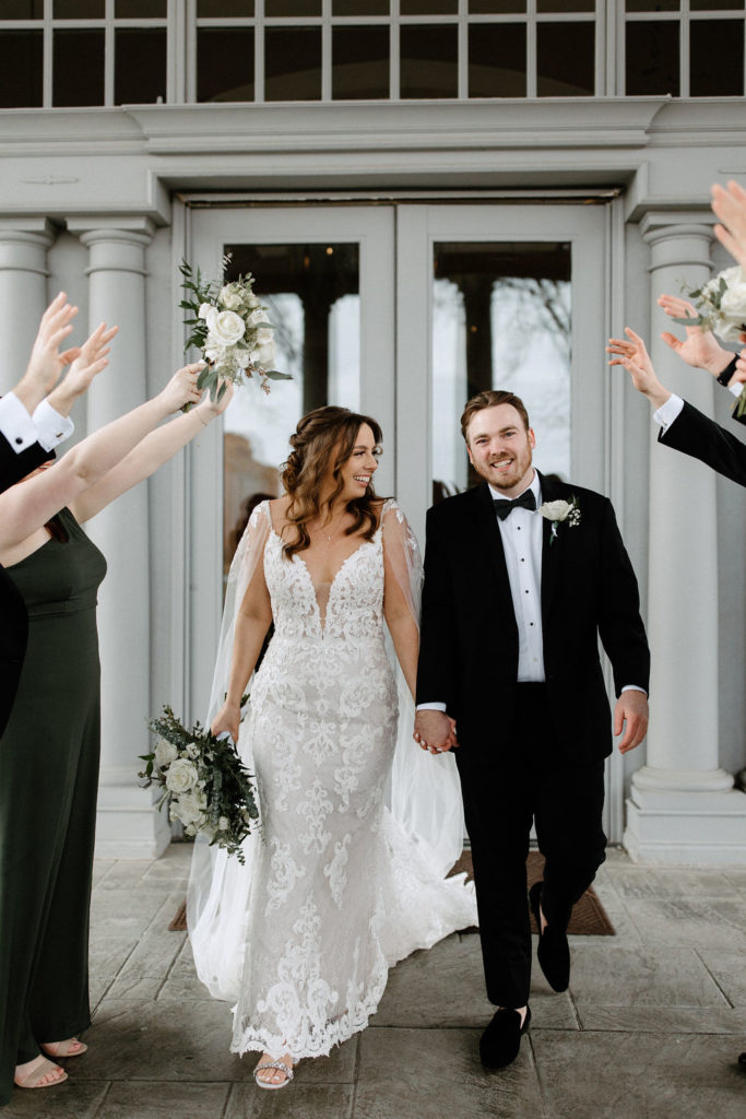 Bridal party posing for photos at The Ritz Charles in Carmel, Indiana