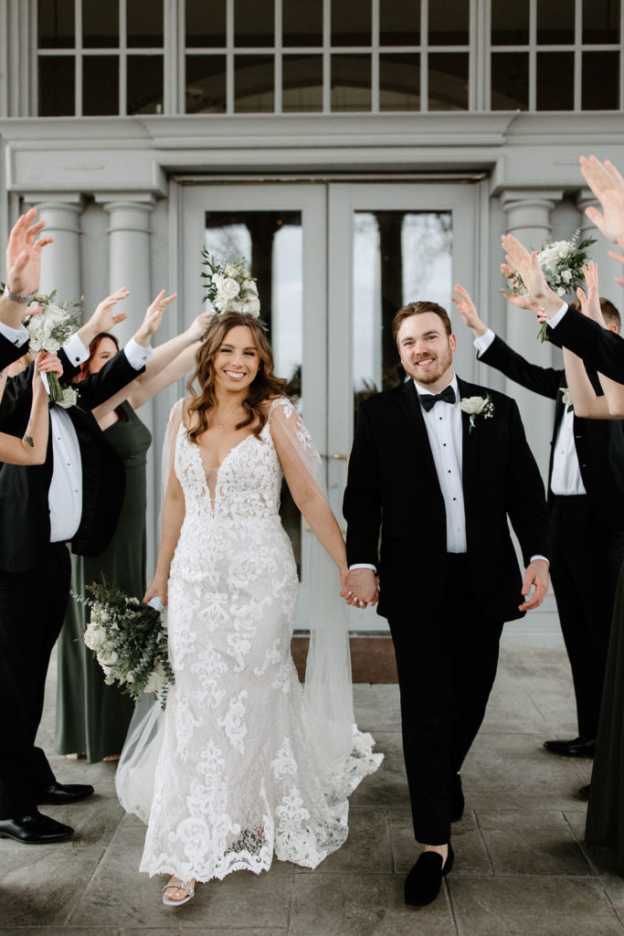 Bridal party posing for photos at The Ritz Charles in Carmel, Indiana