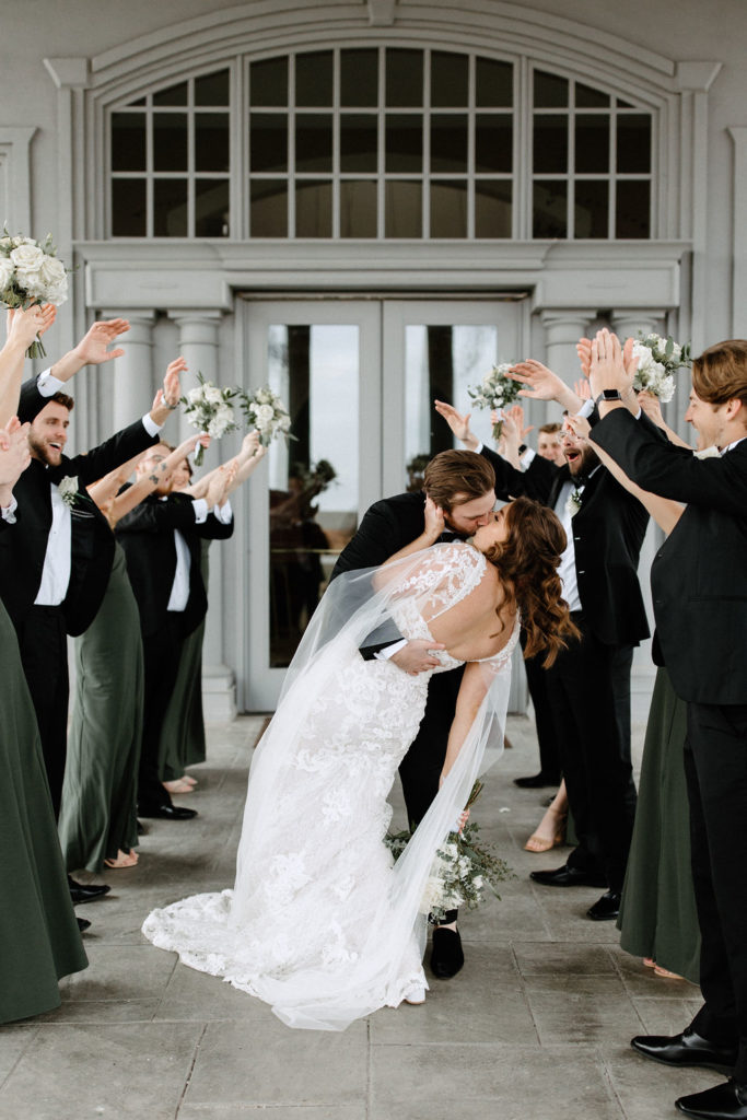 Bridal party posing for photos at The Ritz Charles in Carmel, Indiana