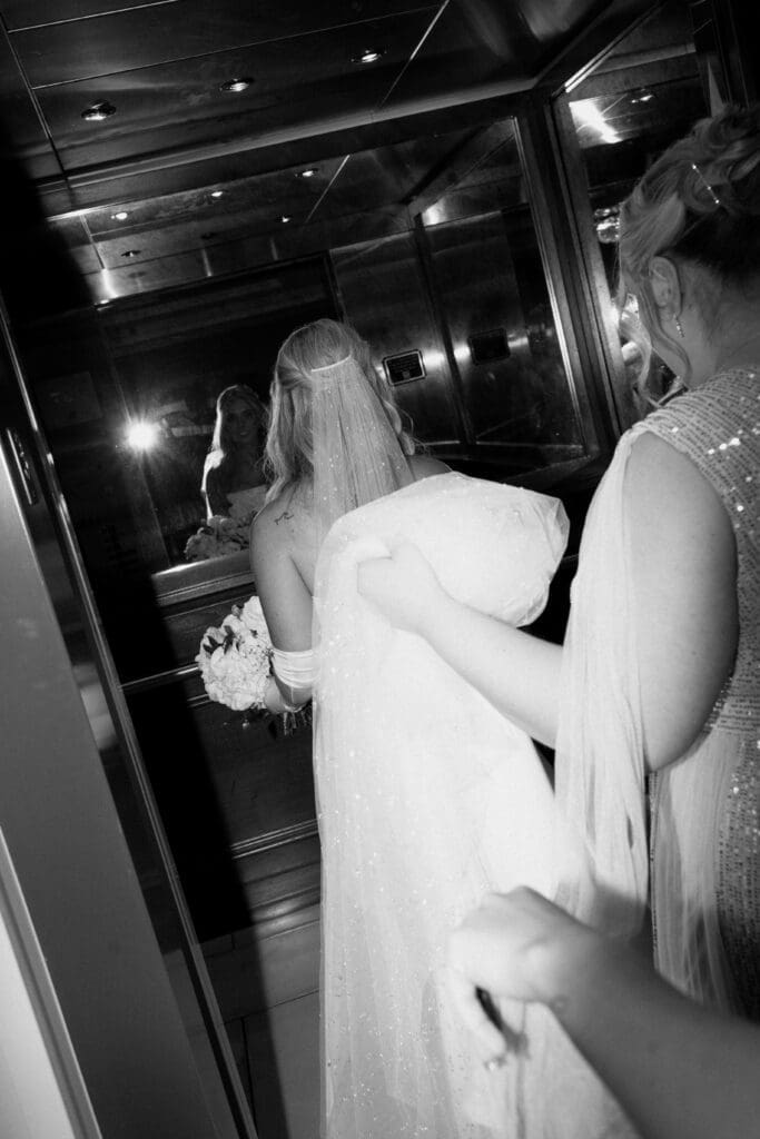 Documentary flash wedding photography at Hotel Carmichael wedding in Carmel Indiana