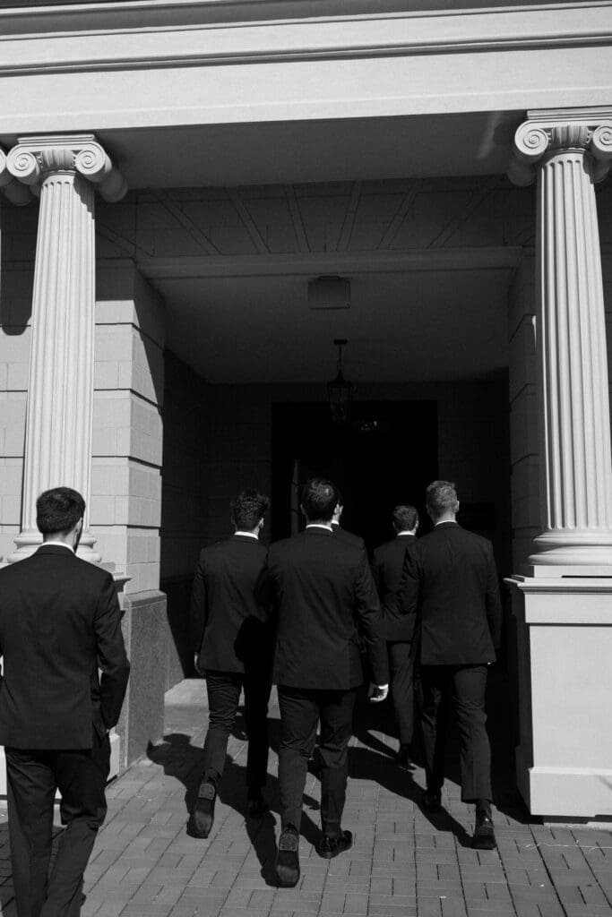 Flash wedding party portraits at carmel indiana wedding at hotel carmichael
